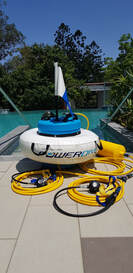 Powerdive Powersnorkel 12 volt Dive Hookah diving equipment ready to float in a swimming pool. 